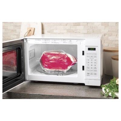 GE Appliances 17" 0.7 cu. ft. 700 Watt Countertop Microwave in White | 10.1875 H x 17.3125 W x 12.75 D in | Wayfair JES1072DMWW