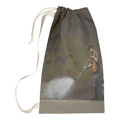 East Urban Home Banksy Graffiti Cave Painting Removal Laundry Bag Fabric in White | Large (36  H x 28  W x 1  D) | Wayfair