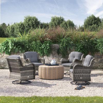 Lark Manor™ Aliyani Swivel Patio Chair w/ Cushions Wicker/Rattan in Gray | 35.5 H x 30 W x 31 D in | Wayfair B66111C4C1A04672811708590F2EA858