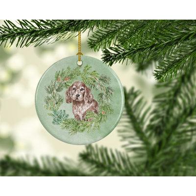 The Holiday Aisle® Cocker Spaniel Puppy Hanging Figurine Ornament Ceramic/Porcelain in Blue/Brown/Green | 2.8 H x 2.8 W x 0.15 D in | Wayfair