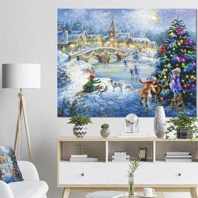 East Urban Home Christmas Tree Decorating Sledding Children - Painting Print Canvas in Blue/Gray | 12 H x 20 W x 1 D in | Wayfair