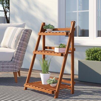 Arlmont & Co. Dorether Plant Stand Wood in Brown | 35.5 H x 23.8 W x 15.1 D in | Wayfair 94E7B924337040B6A09A45C3A561C2B1