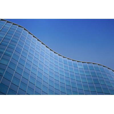 Ebern Designs Glass Building Exterior - Wrapped Canvas Photograph Metal in Blue | 32 H x 48 W x 1.25 D in | Wayfair