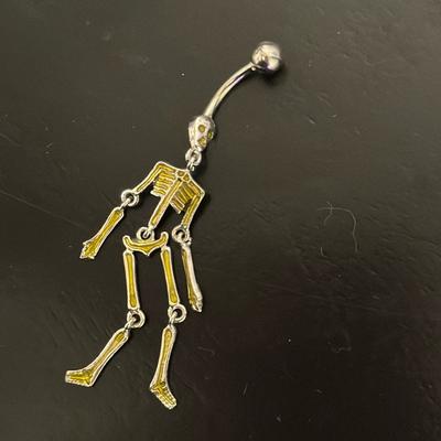 Urban Outfitters Jewelry | Glow In The Dark Skeleton Belly Button Ring | Color: Green/Silver | Size: Os