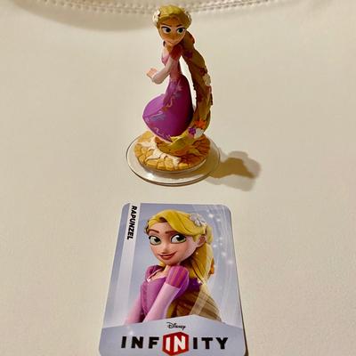 Disney Toys | Disney Infinity Rapunzel Figure And Web Code Card | Color: Orange/Purple | Size: Os