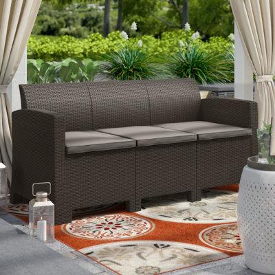 Winston Porter 67.7" Wide Outdoor Patio Sofa w/ Cushions Wicker/Rattan in Gray/Brown | 29.92 H x 67.7 W x 25.82 D in | Wayfair