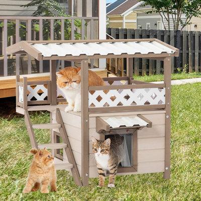 Tucker Murphy Pet™ Deeandra Outdoor Cat House w  Escape Door, 2 Story Cat House Outside Cat House, PVC Roof in Brown White | Wayfair