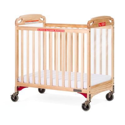 Child Craft Safe Haven Professional Series Evacuation Mini Portable Crib w/ Mattress Wood in Brown | 38 H x 26.25 W in | Wayfair F99042.04