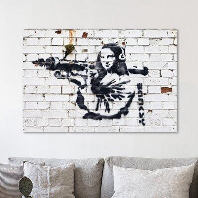 Wrought Studio™ 'Mona Lisa Bazooka' Graphic Art Print on Wrapped Canvas & Fabric in White, Size 24.0 H x 36.0 W x 1.5 D in | Wayfair