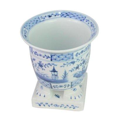 Bungalow Rose Footed Porcelain Planter Dark Ceramic in Blue | 10 H x 8.5 W x 8.5 D in | Wayfair 23AC377DC9D14E8EA1BE041BA75FE6D1