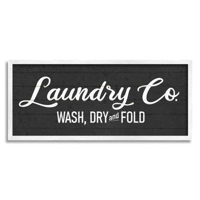Stupell Industries Rustic Wash Dry Fold Laundry Room Text Sign Wood in Brown | 1.5 D in | Wayfair am-233_wfr_10x24