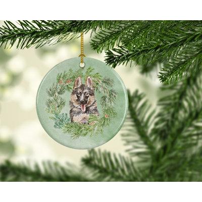 The Holiday Aisle® German Shepherd Puppy Smiling Christmas Round Hanging Figurine Ornament /Porcelain in Green | 2.8 H x 2.8 W x 0.15 D in | Wayfair